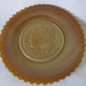 Antique Chocolate Slag Glass Butter Pat with 1889 Coin Replica Center Impressed in the glass scalloped rim Beautiful color and condition
