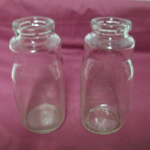 Antique Pair of Half Pink size milk bottles Clear glass great condition