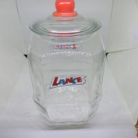 Sold at Auction: Large Glass Lance Jar w/Metal Lid