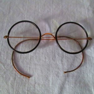 Pair of Wire Rim Eye Glasses with black bakelite around lenses early 1900's Gold fill frames