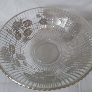 Beautiful Ribbed Glass Bowl with Sterling Silver Applied to the inside of the bowl Lily pads and flowers sterling rim