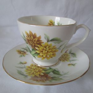 Beautiful Vintage Tea Cup and Saucer Fine Bone China Yellow & mustard yellow Floral Duchess England