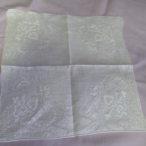 Beautiful white on white hankie embroidered appliquéd with lace pattern
