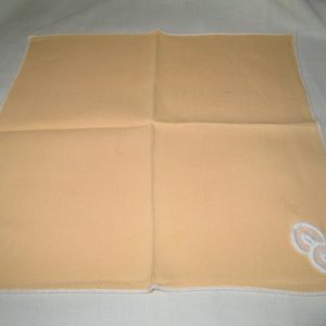 Pretty Pale Orange color handkerchief with small white applique circles and whtie trimmed edge