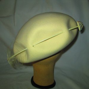 Stunning Ivory Tam Style Hat Pierced with an Arrow and feather Rhinestones Tom Hann Studios