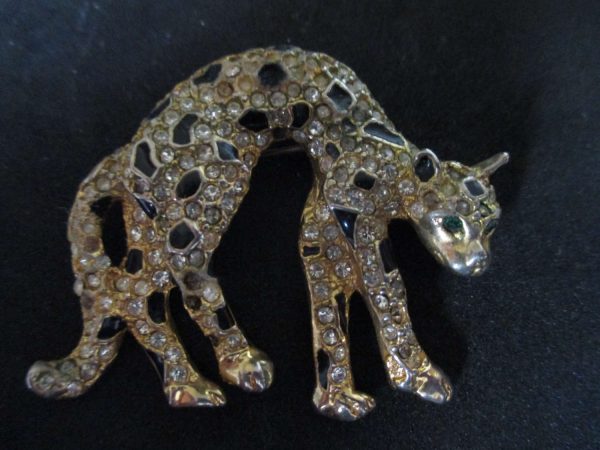 Vintage Leopard Pin gold with Black and clear rhinestones green rhinestone eyes