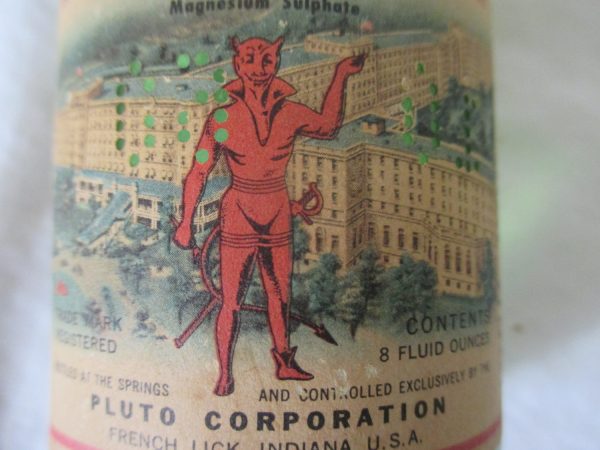 Vintage PLUTO America's Laxative 8oz Glass Bottle Embossed Bottom Devil Label, front label & lid