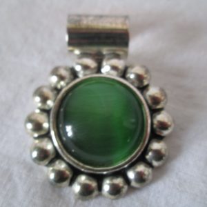 Vintage sterling silver necklace drop with green cat eye style stone center