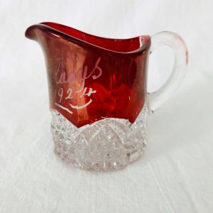 1924 - United States New York City, United States Souvenir cut glass cream pitcher miniature with red top Gladys etched