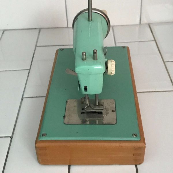 Child size Signature Junior sewing machine hand crank Western Germany Metal with Dovetail Wooden Base 1940's