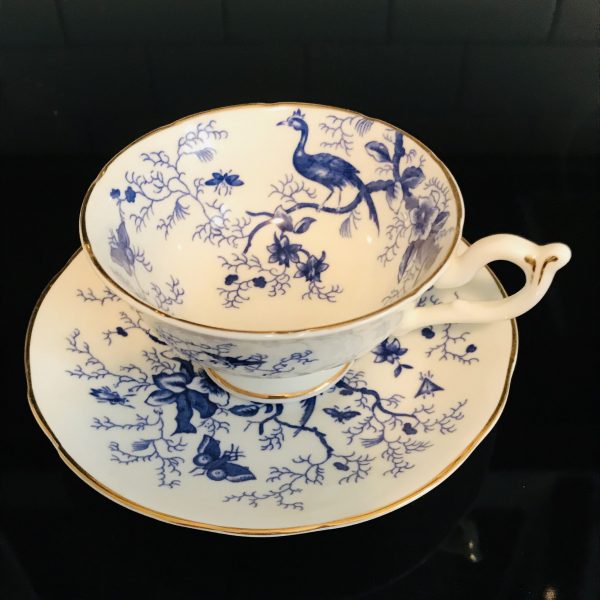 Coalport tea cup and saucer England Fine bone china Royal Blue Birds bugs trees pattern gold trim farmhouse collectible display
