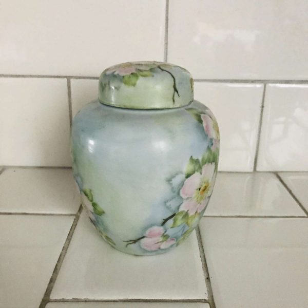 Hand painted ginger jar with lid vase container tea caddy fine bone china collectible pink lotus flower yellow centers blue green background