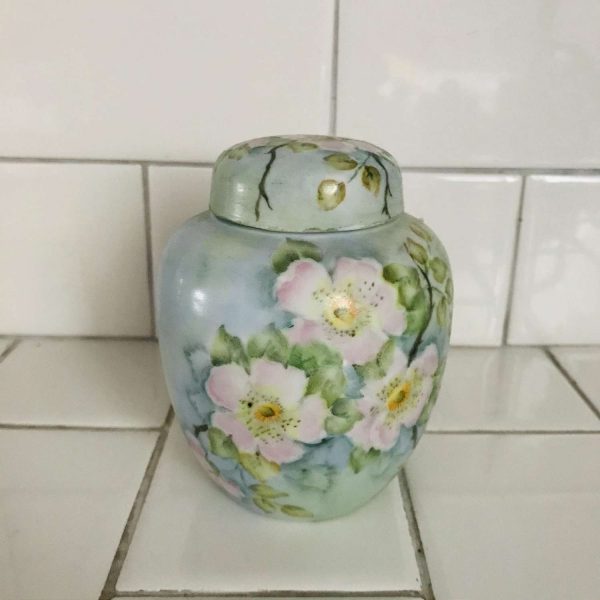 Hand painted ginger jar with lid vase container tea caddy fine bone china collectible pink lotus flower yellow centers blue green background