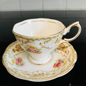 Royal Albert tea cup and saucer England Fine bone china Boquets with scrolls gold trim farmhouse collectible display coffee serving