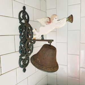 Rustic Farmhouse Dinner Bell Outdoor call bell with large ringer cherub top ornate hanger collectible display farm barn ranch cast iron