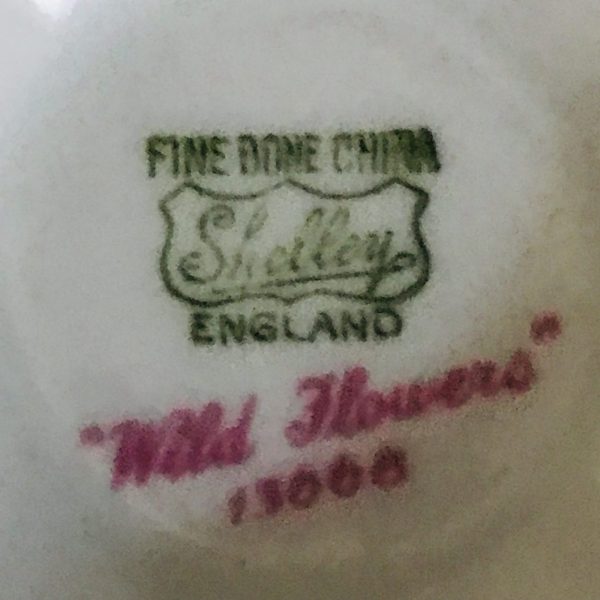 Shelley Tea cup and saucer England Fine bone china English light blue trim & handle Wild Flowers farmhouse cottage purple