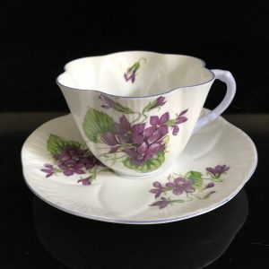 Tea cup and saucer Shelley England Fine bone china purple Violets yellow centers lavender trim & handle farmhouse collectible display coffee