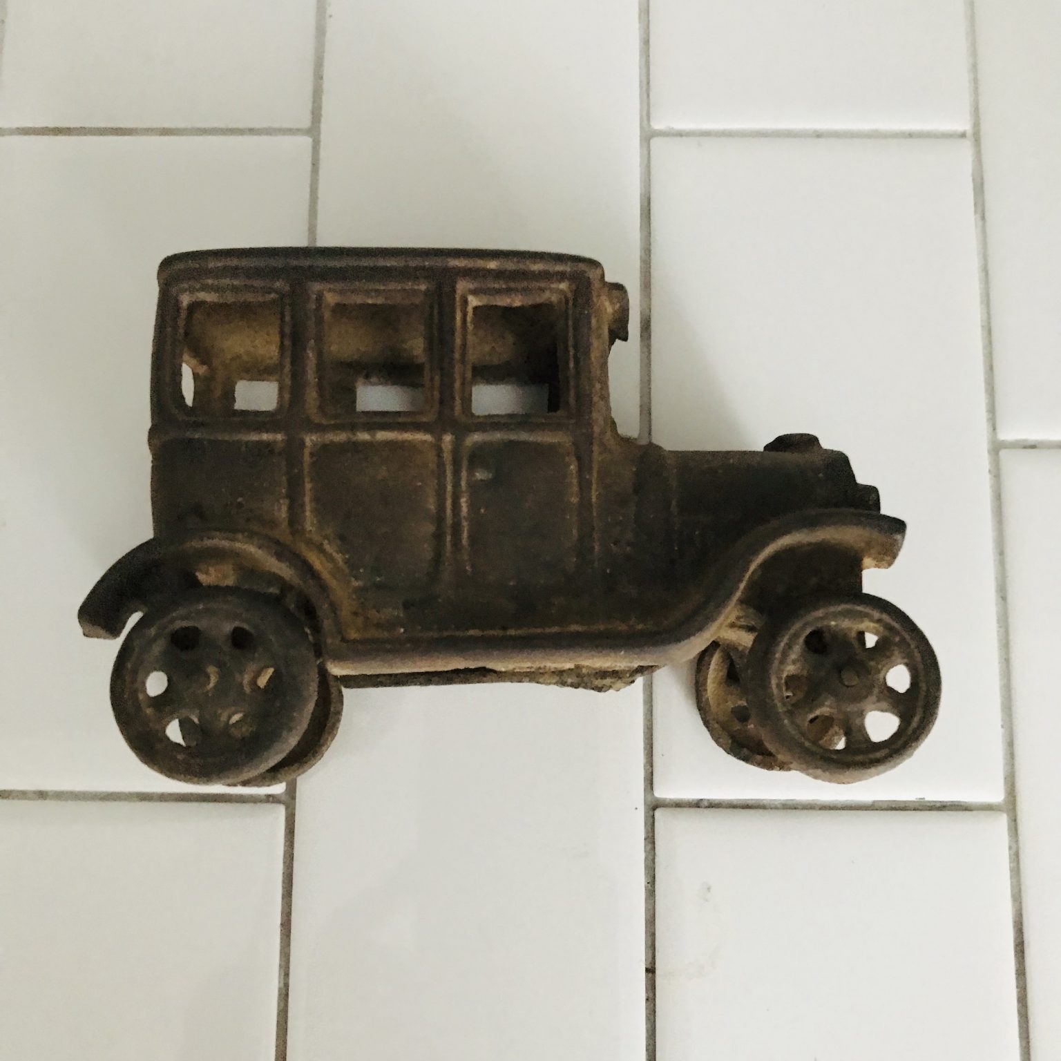 Vintage Cast Iron Car Toy Collectible metal with rotating cast iron