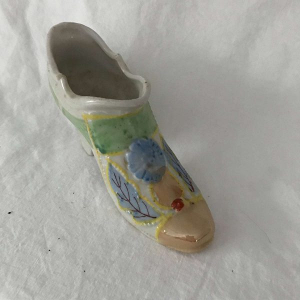 Vintage Collectible Porcelain Shoe Figurine Floral pattern high heel with blue flower and leaves iridescent toe
