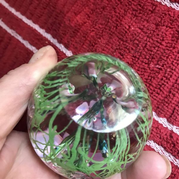 Vintage glass paperweight with pink and purple flowers inside hand blown glass office collectible display
