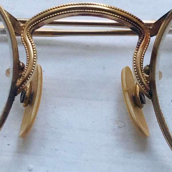 Vintage Large brass rimmed eyeglasses with glass intact single vision 4 1/4" across