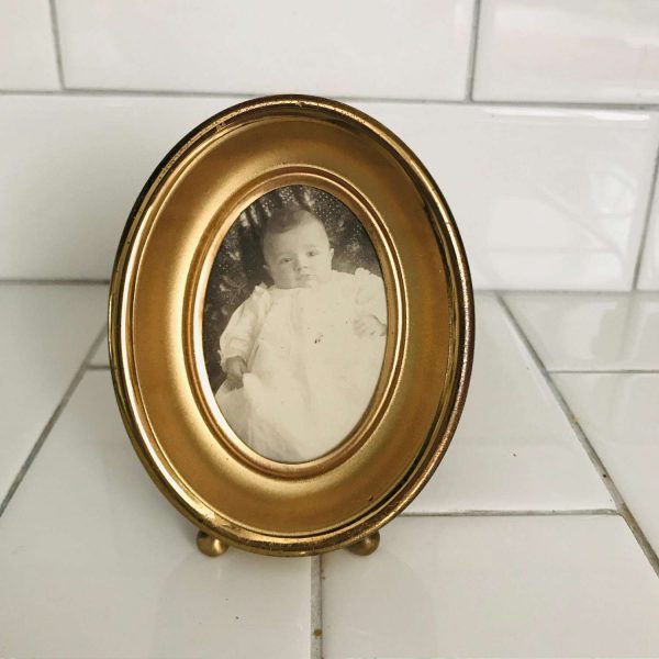 Vintage oval picture frame gold tone with baby photo from the 1940's collectible display farmhouse