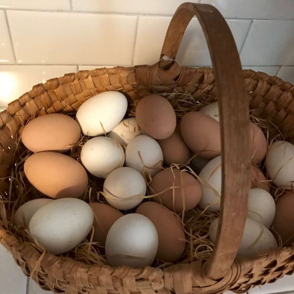 Vintage Ozarkland hand crafted basket of porcelain eggs brown and white collectible chicken display farmhouse
