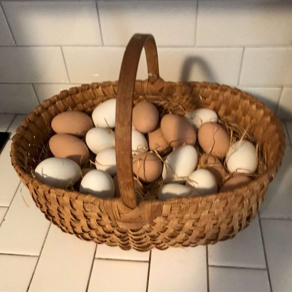 Vintage Ozarkland hand crafted basket of porcelain eggs brown and white collectible chicken display farmhouse