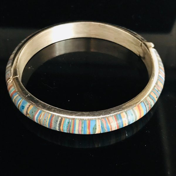 Vintage Sterling Silver jewelry bangle with multi slices of inset polished stones 2 3/8" across opening spring clip closure
