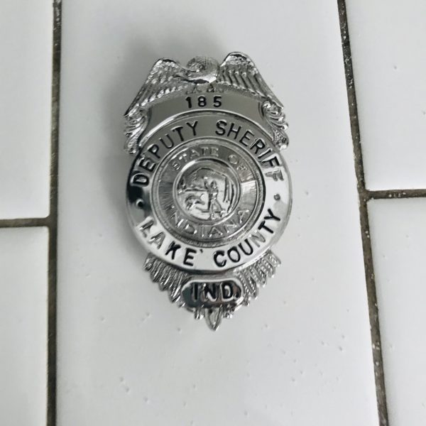 Obsolete Vintage Badge Deputy Sheriff Lake County IND,  Silver with black print enamel 1960's