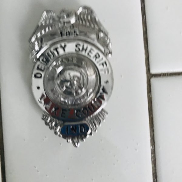 Obsolete Vintage Badge Deputy Sheriff Lake County IND,  Silver with black print enamel 1960's