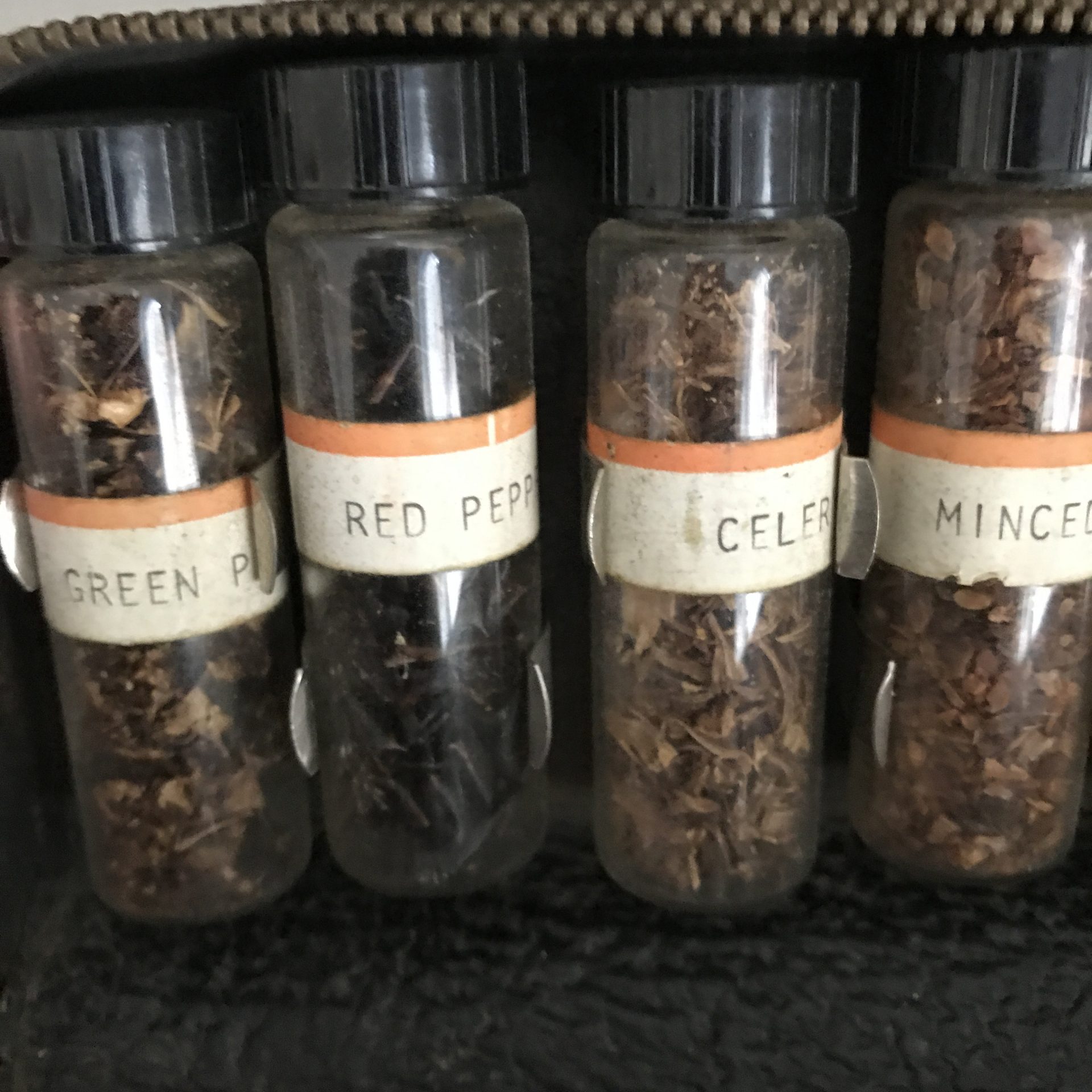 https://www.truevintageantiques.com/wp-content/uploads/2021/05/antique-spice-travel-set-culinary-cooking-glass-spice-jars-in-leather-case-with-metal-zipper-spices-intact-turn-of-the-century-collectible-609933e64-scaled.jpg