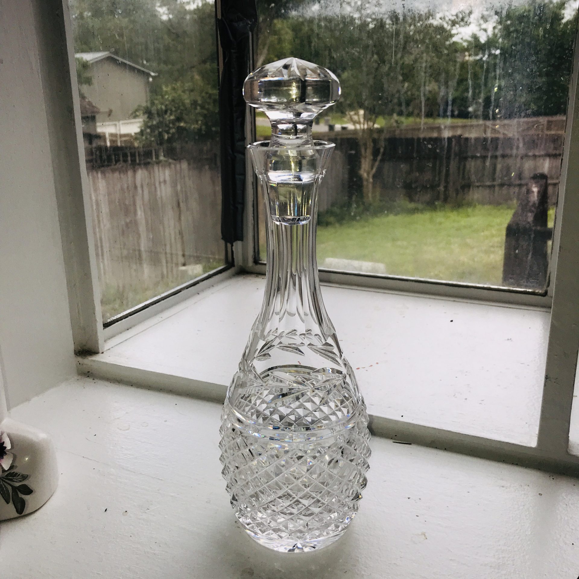 https://www.truevintageantiques.com/wp-content/uploads/2022/05/beautiful-vintage-waterford-crystal-cut-decanter-heavy-weight-beautiful-pattern-collectible-display-fine-crystal-collectible-display-barware-629171d01-scaled.jpg